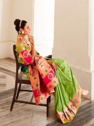Charming Light Green Zari Weaving Silk Traditional Saree With Blouse